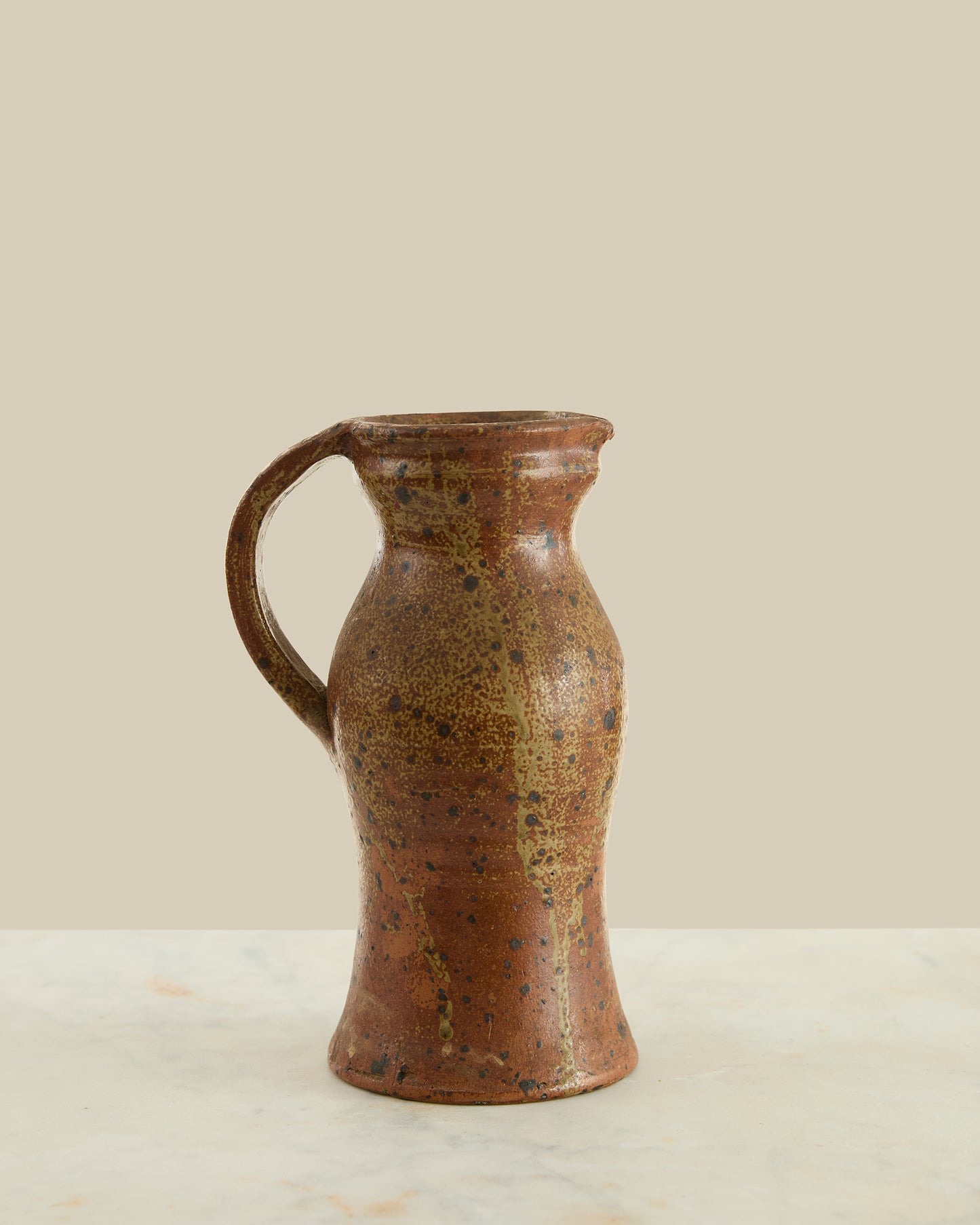 Large speckled ceramic pitcher