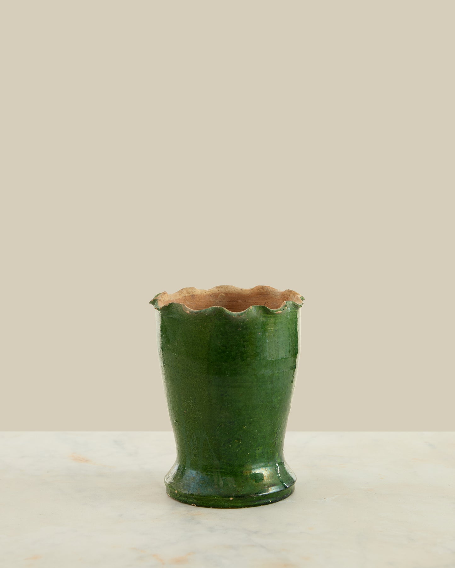 Green scalloped vase