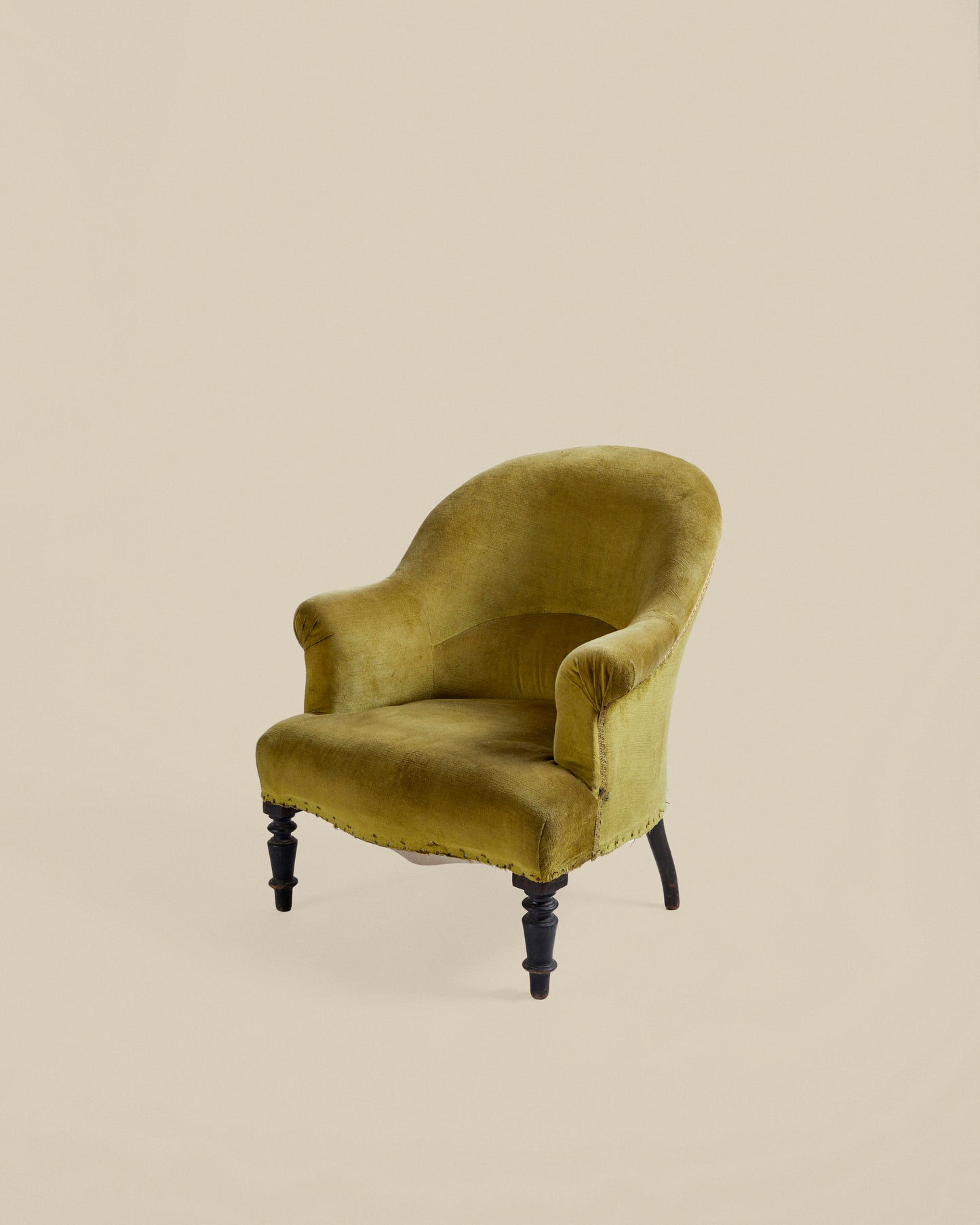 Green upholstered Napoleon armchair