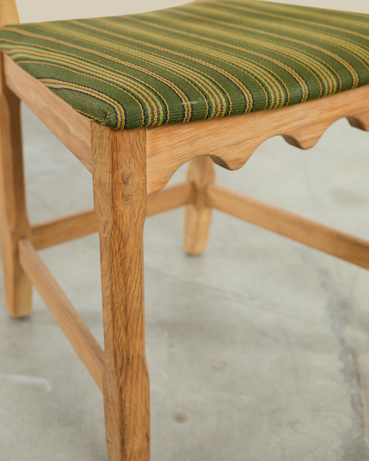 Pair of Henning Kjaernulf green uphosltery dining chairs