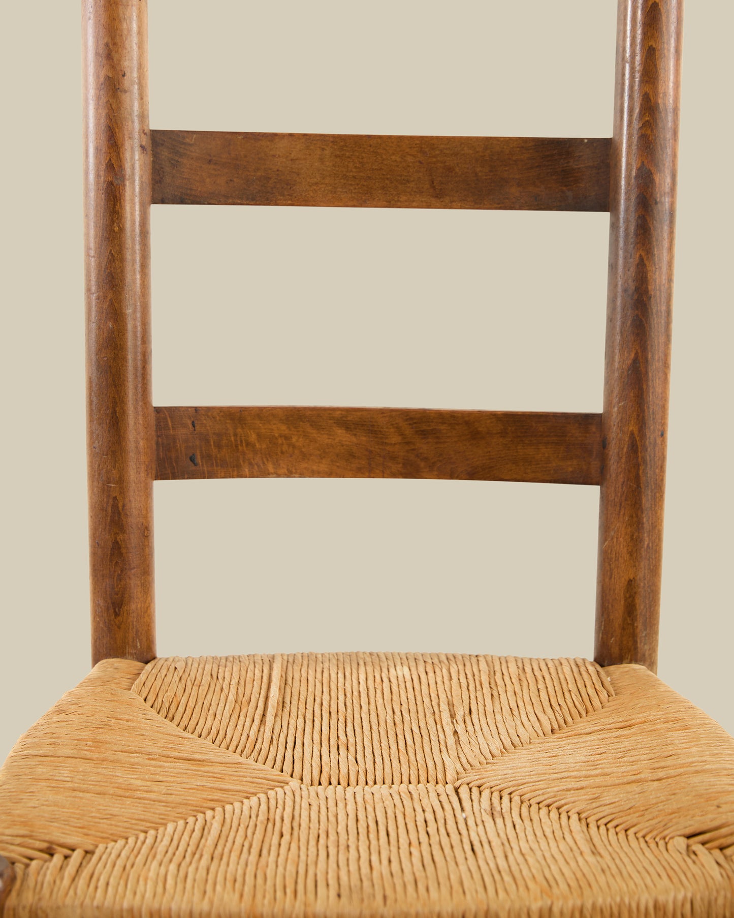 Pair of ladder back rush seat dining chairs