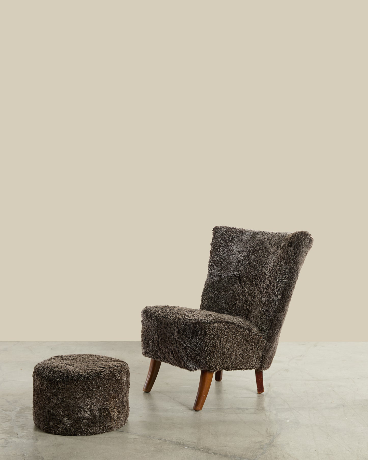 Scandinavian boucle wool chair and ottoman