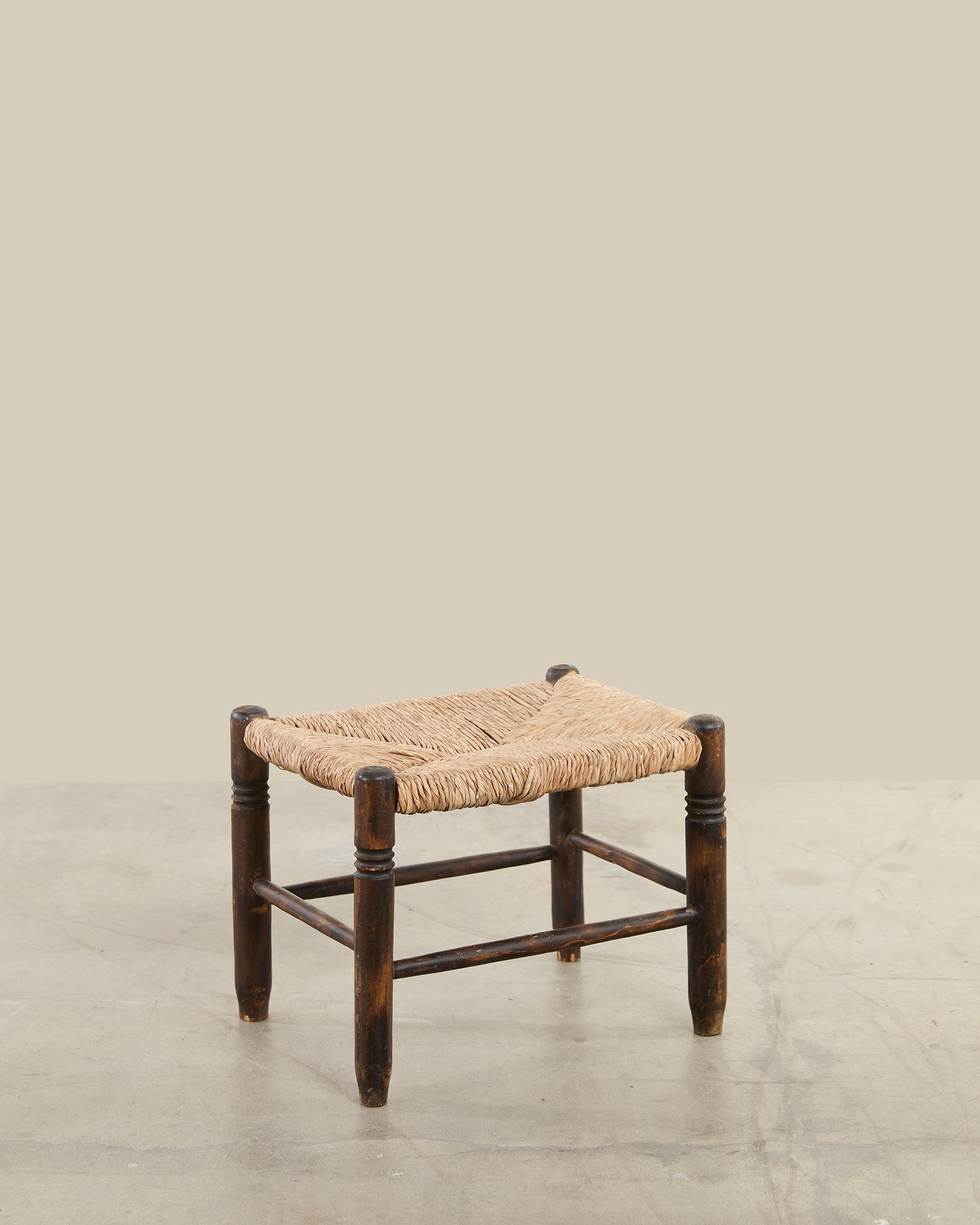 Dark walnut rush stool