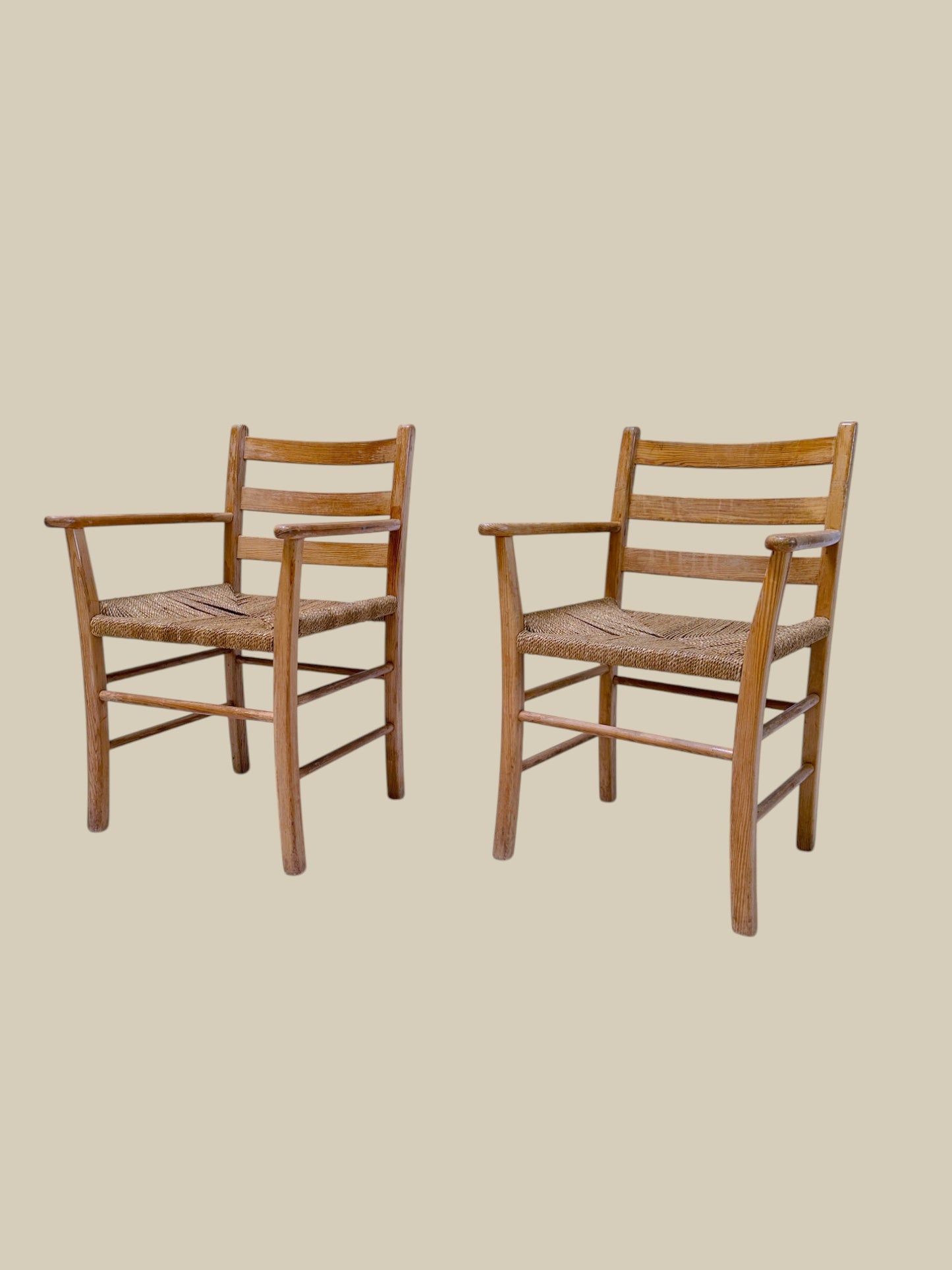 Pair of Fritz Hansen pine rush arm chairs