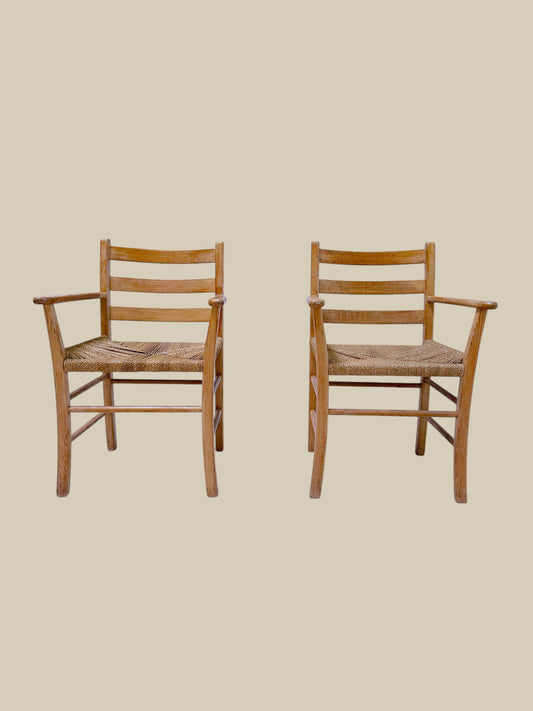 Pair of Fritz Hansen pine rush arm chairs
