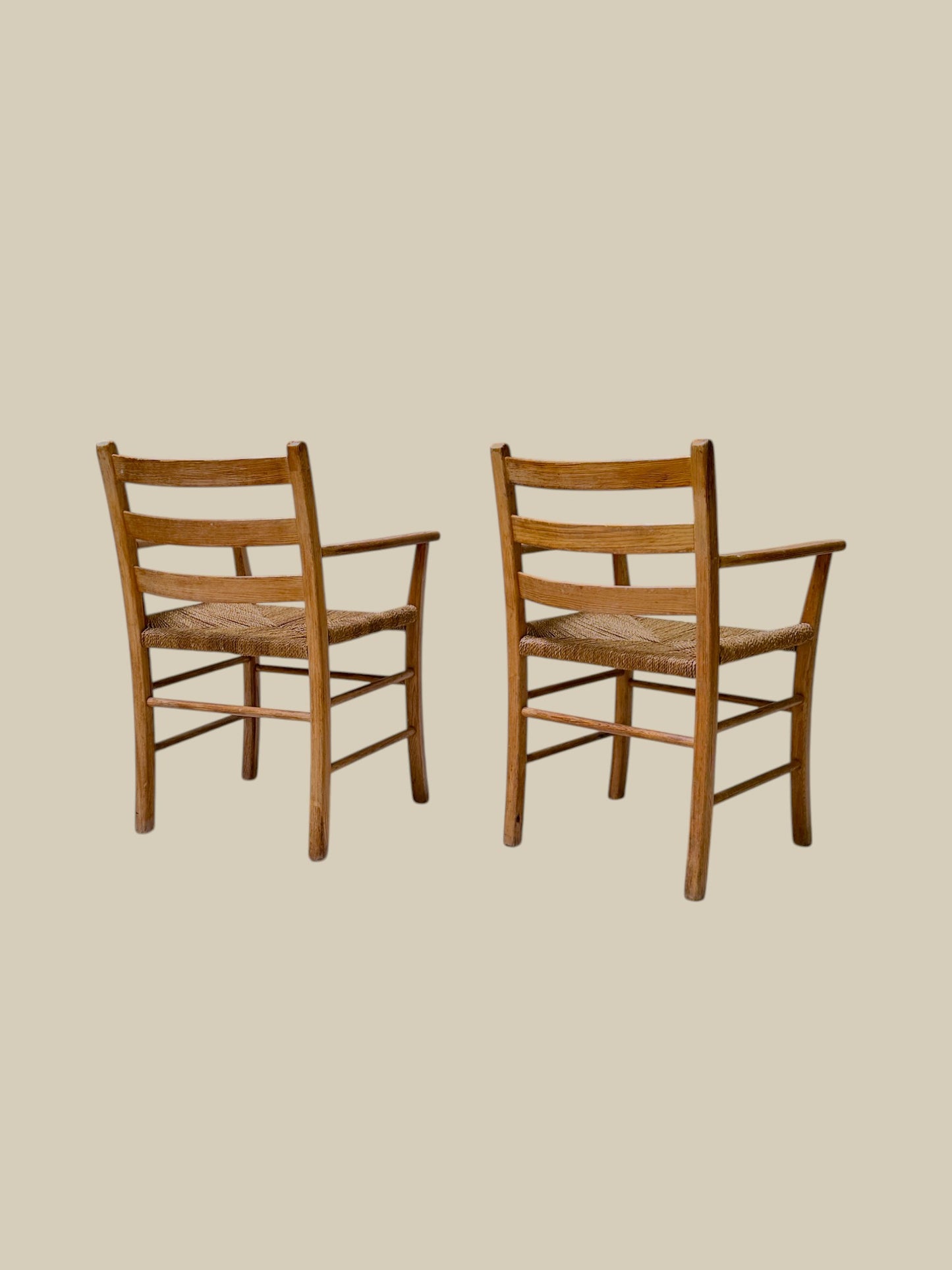 Pair of Fritz Hansen pine rush arm chairs