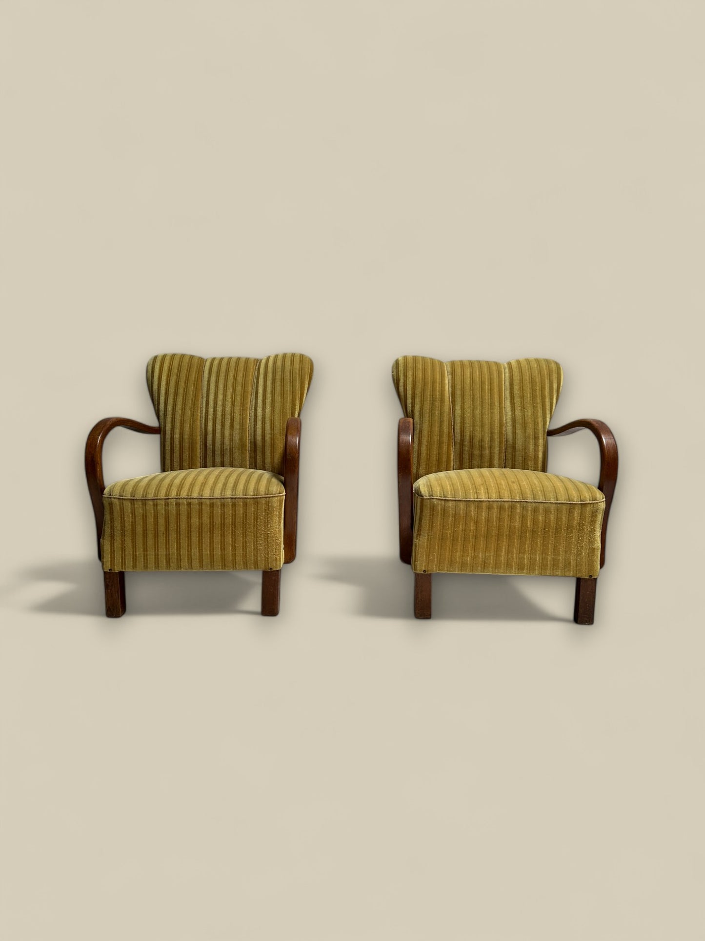 Pair of Fritz Hansen striped mohair lounge chairs