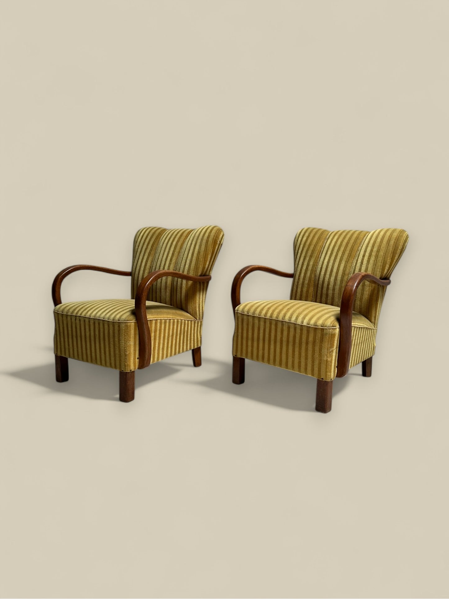 Pair of Fritz Hansen striped mohair lounge chairs