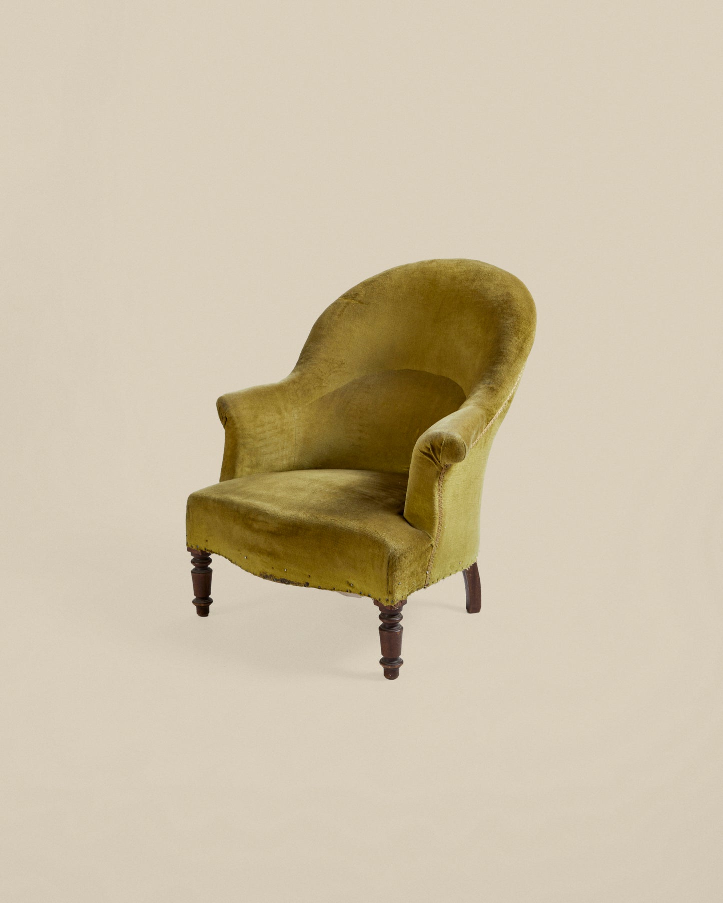 Green upholstered Napoleon armchair