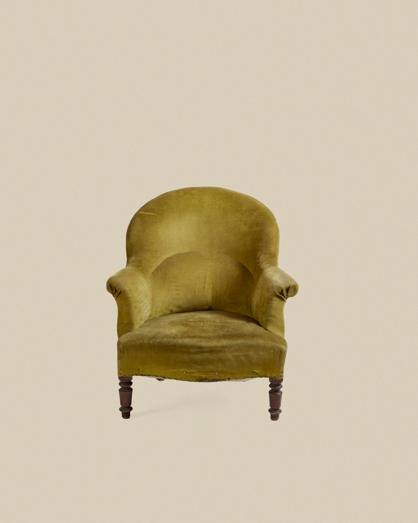 Green upholstered Napoleon armchair