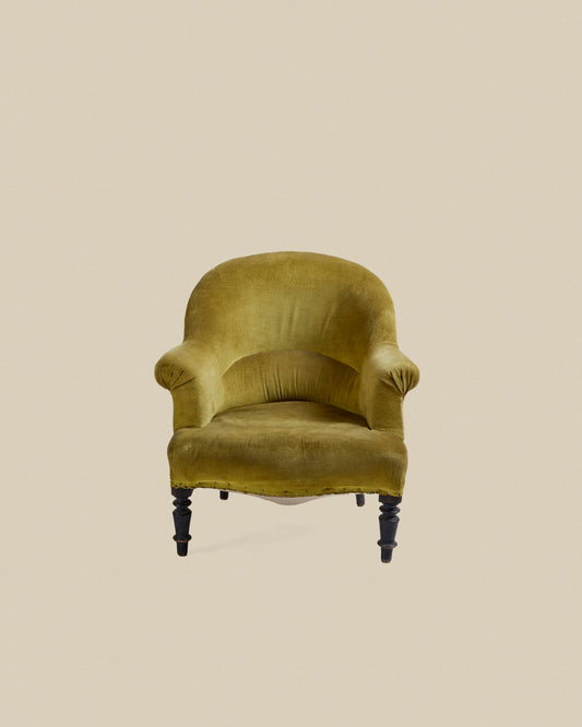 Green upholstered Napoleon armchair